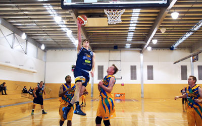 Benji Tamir skies for the lay-up earlier in the season. Photo: Peter Haskin