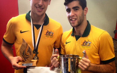 Futsalroo teammates, Trans-Tasman MVP Jordan Mundell (left) and Jarrod Basger,
holding the series cup.