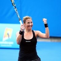 A jubilant Pe'er after her round one qualifying win. Photo: Peter Haskin