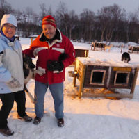 Bev and John Rosenberg brave the snow near Kirkenes, Norway.