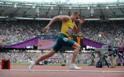 Australian athlete Steven Solomon competes during the 1st round of the Men's 400m at the Olympic Games in London, Saturday, Aug 4, 2012. (AAP Image/Dave Hunt) NO ARCHIVING