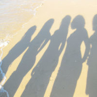 2009-10 holiday photo winner: Teenage girls silhouetted on the beach at Portsea entered by Michelle Sobel.