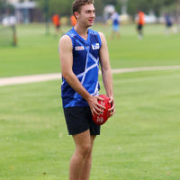 Members of the Unity Cup teams during training at Caulfield Park wearing their new jumpers that were designed by Year 12 student  Jayden Beville. Photo: Peter Haskin