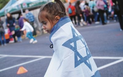 A participant at a previous Yom Ha’atzmaut Family Festival. Photo: Peter Haskin