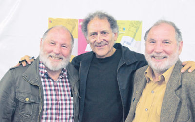 Author Arnold Zable with Henry Nissen (left) and his twin brother Leon at the Melbourne Jewish Writers Festival. Photo: Morry Frenkel