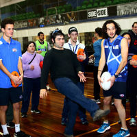 15-6-16. AFL multi cultural round. Members of Maccabi All Abilities working on their football skills at the Collingwood Footbal Club. Photo: Peter Haskin