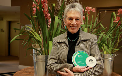 Suicide prevention advocate Dianne Gaddin with her 2016 Suicide Prevention Australia LiFE Award for individual contribution to community engagement. Photo: Shane Desiatnik.