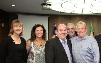 All smiles: Yair Miller (centre) with other Jewish members of the St Ives community, directly after Ku-ring-gai Council's decision to approve the St Ives Eruv. Photo: Shane Desiatnik