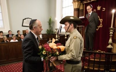 Senator Eric Abetz prepares to lay a wreath at Hobart Synagogue on October 26. Photo: Tony Lomans/Island 26