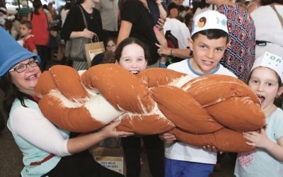 From left: Laya Slavin, Tessa Resnick, Jono Amoils and Davina Resnick at last year’s Challah Bake.
Photo: Giselle Haber