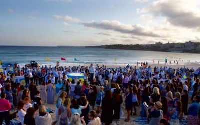 A Shabbat Project event held at Bondi Beach at dusk on November 11. Photo: Giselle Haber