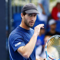 11-1-17. Israel’s Amir Weintraub went down in straight sets 2-6 2-6 to Ivan Dodig from Croatia in the first round of qualifying for the Australian Open. Photo: Peter Haskin