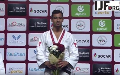 Tal Flicker receiving his medal.