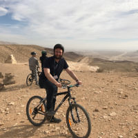Rabbi Daniel Rabin riding in the Negev.
