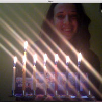 Sarah Ben-Simon lights Chanukah candles in Bolivia as mum Leonie watches on Skype.
