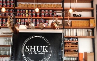 The Shuk is at the centre of a new row between CK and the KA. The Shuk is at the centre of a new row between CK and the KA.