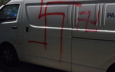 Defaced vehicles in St Ives.