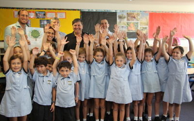 Year 2 Moriah College students with (back from left) Rabbi Benji Levy, teacher Michal Levy-Hardy, KKL-JNF head of education Shlomo Deri, KKL-JNF world chairperson Danny Atar and JNF Australia education shaliah Yigal Nisell. Photo: Shane Desiatnik