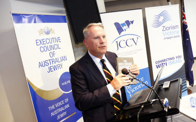 Colonel Richard Kemp with Alex Ryvchin's book, The Anti-Israel Agenda. Photo: Peter Haskin