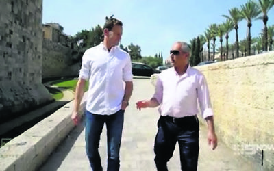 Tom Steinfort (left) speaks with Daniel Luria in the 60 Minutes report. Photo: Screengrab.