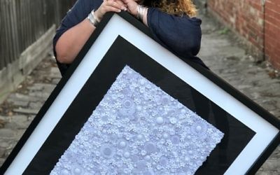 Justine Kuran with one of her latest quilling works.