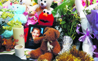 A photo of Thalia amid the floral tributes at the site of the Bourke Street tragedy last year. Photo: Peter Haskin