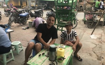 Richie Harkham with Tai, an 11-year-old boy he met in Myanmar.