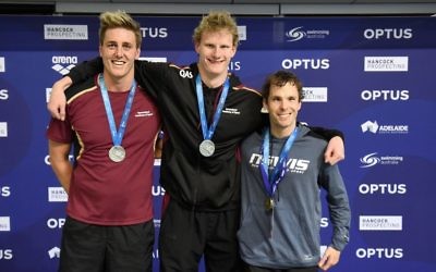 Matthew Levy (right) with his gold medal for winning the men's multi-class 400 free final. Photo: Delly Carr/Swimming Australia Ltd