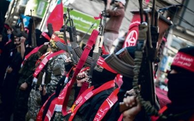 Popular Front for the Liberation of Palestine supporters rally in Gaza.
Photo: AAP Image/CrowdSpark/Mhmed Ali