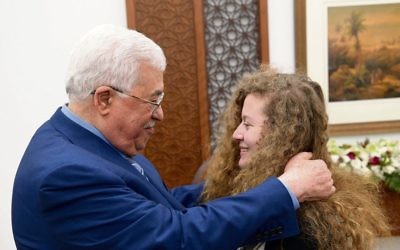 Mahmoud Abbas welcoming Ahed Tamimi after her release from an Israeli prison. Photo: EPA/Thaer Ghanaim