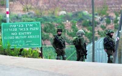 IDF personnel in Metulla on Tuesday. Photo: AP Photo/Ariel Schalit