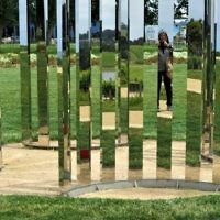 Judi Schiff self-portrait in Jeppe Hein's sculpture at the Point Leo Sculpture Park.