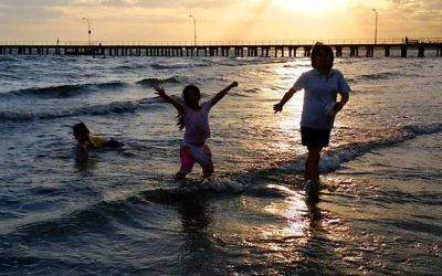 Melly Legiman's children enjoying Dromana beach.