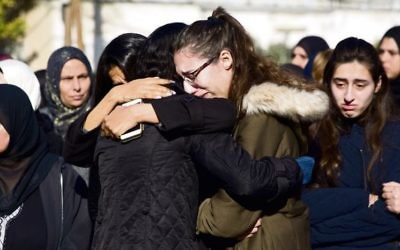 Mourners at the funeral of Aiia Maasarwe in Israel last week. Photo: AP Photo/Ariel Schalit