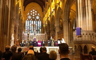 JBOD president Lesli Berger on stage with other faith leaders at St Mary's Cathedral.