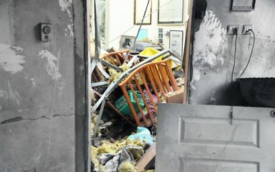An Israeli house hit by a Hamas rocket this week. Photo: Israel Police