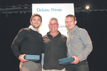 AJAX football captain Jason Ritterman (left) and North Caulfield soccer player Ari Ritz (right) shared the Victoria Maccabi club sportsman of the year award. They are pictured with former Maccabi president Russell Jaffe. 