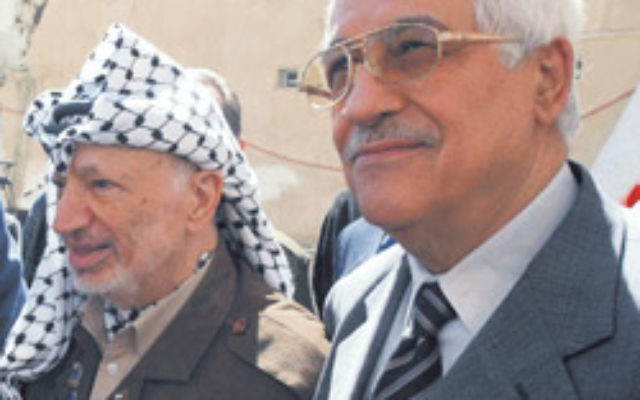 The late Yasser Arafat (left) with current Palestinian Authority President Mahmoud Abbas. Photo: AJN file