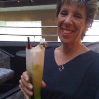 Raie Moss samples a cocktail in Melbourne. 
Photo entered by Judy Kohn.