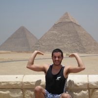 Peter Cherny lifts the pyramids in Egypt in July 2009. Photo entered by Lynette Cherny.