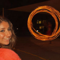 Laura Werman watches Fijian firedancers on New Year's Eve on Denarau Island, Fiji. Photo entered by Sue Werman of Killara, NSW.