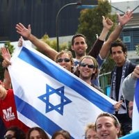 Tennis fans show their support for Israeli star Dudi Sela at the Australian Open on January 19. Photo: Peter Haskin