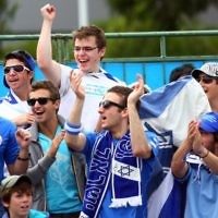 Tennis fans show their support for Israeli star Dudi Sela at the Australian Open on January 19. Photo: Peter Haskin