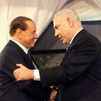 Italian Prime Minister Silvio Berlusconi is greeted by Israeli Prime Minister Binyamin Netanyahu in Jerusalem on February 1. Photo: Isranet. Italian Prime Minister Silvio Berlusconi is greeted by Israeli Prime Minister Binyamin Netanyahu in Jerusalem on February 1. Photo: Isranet.