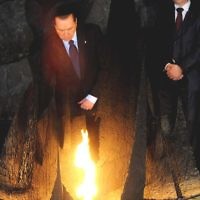 Italian Prime Minister Silvio Berlusconi Silvio Berlusconi lights the memorial flame at the Holocaust Memorial in Yad Vashem on February 1. Photo: Isranet Italian Prime Minister Silvio Berlusconi Silvio Berlusconi lights the memorial flame at the Holocaust Memorial in Yad Vashem on February 1. Photo: Isranet