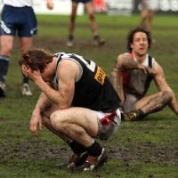 5-9-10. AJAX v Beaumaris. 2nd Semi Final. Shattered AJAX players Jake Lew and Gary Bleiden slump to the ground after their 4 point loss. Photo: Peter Haskin 5-9-10. AJAX v Beaumaris. 2nd Semi Final. Shattered AJAX players Jake Lew and Gary Bleiden slump to the ground after their 4 point loss. Photo: Peter Haskin