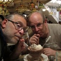 Alan Rothschild of Caulfield North, Victoria is pictured with Burt Kuran (right) enjoying an ice chocolate at Times Square, New York in July 2010.