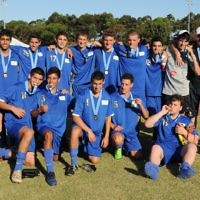 The Australian youth football team after winning gold. Photo: Henry Benjamin