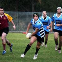 Maccabi NSW Rugby. Nathan Ezekiel looks to pass off. Photo: Ingrid Shakenovsky.
