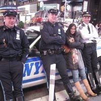 Abie Munz of St Kilda East, Victoria, entered this photo of Tanya Munz with some of New York's finest in April 2010.